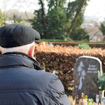 old man in cemetery