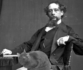 Dickens with cat on lap