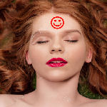 redhead with smiley face on forehead