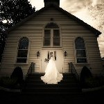 bride by church door
